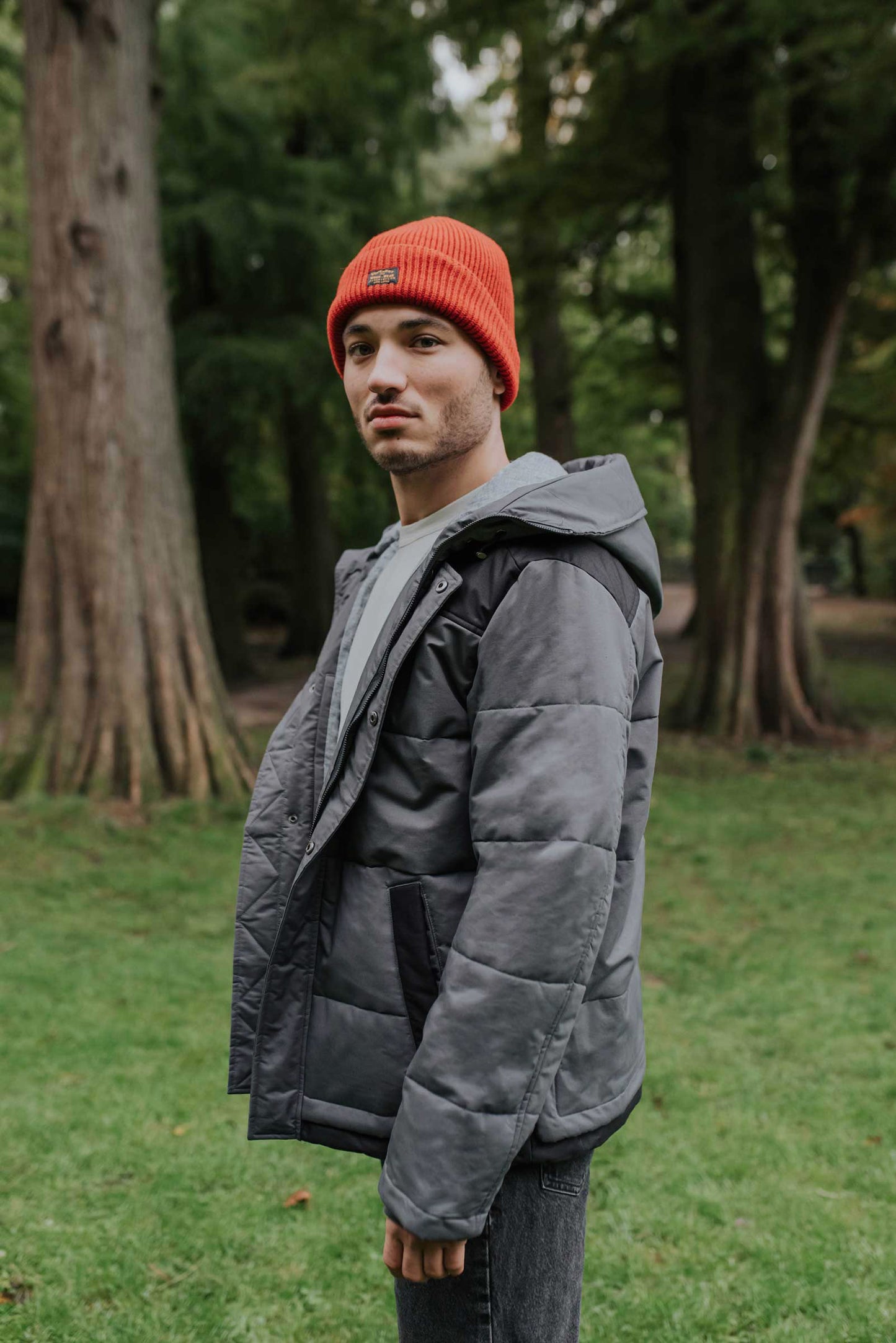 All weather proof sustainable hemp winter jacket, with an adjustable hood, ribbed knit cuffs with thumbholes and zipper windguard to keep the elements out. The soft vegan padding is made from 100% certified recycled plastic bottles, by the innovative Repreve® - Side View