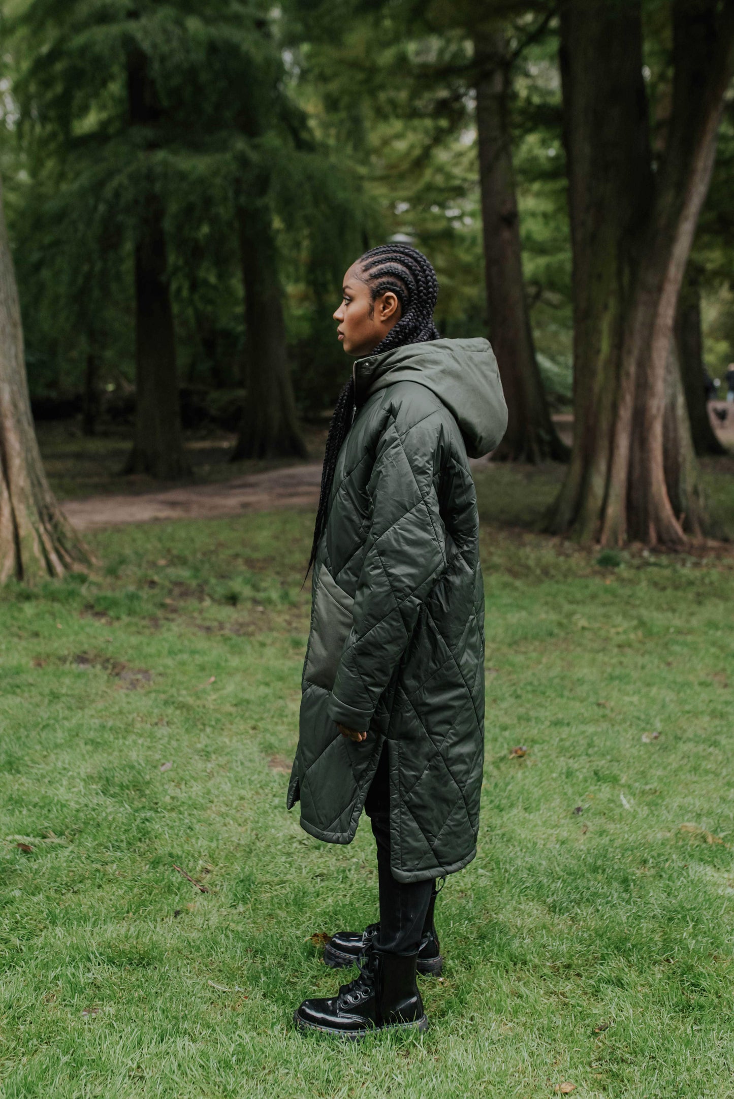 Sustainable army green oversized hemp puffer coat made from 100% deadstock fabrics. Featuring a soft lightweight insulation made from certified recycled PET from Repreve® that is 100% vegan and cruelty-free. Side View
